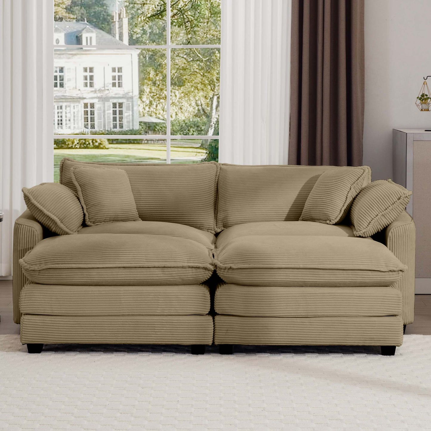 Comfortable tan corduroy sofa with plush throw pillows perfect for a cozy living room