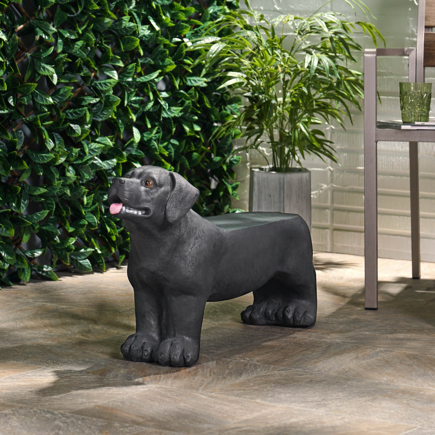 Black resin dog statue bench with weathered finish perfect for garden