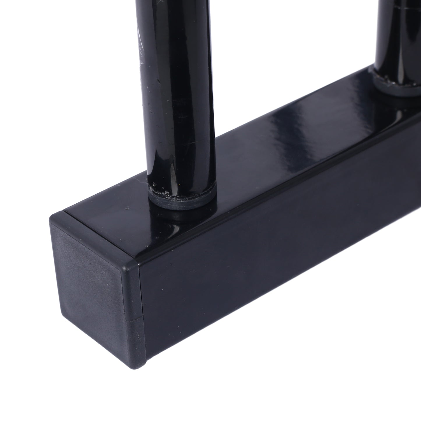 Black metal barbell rack base with rubber foot