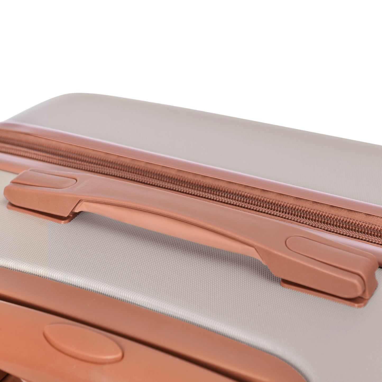 Close up of a grey suitcase with a brown zipper and handle