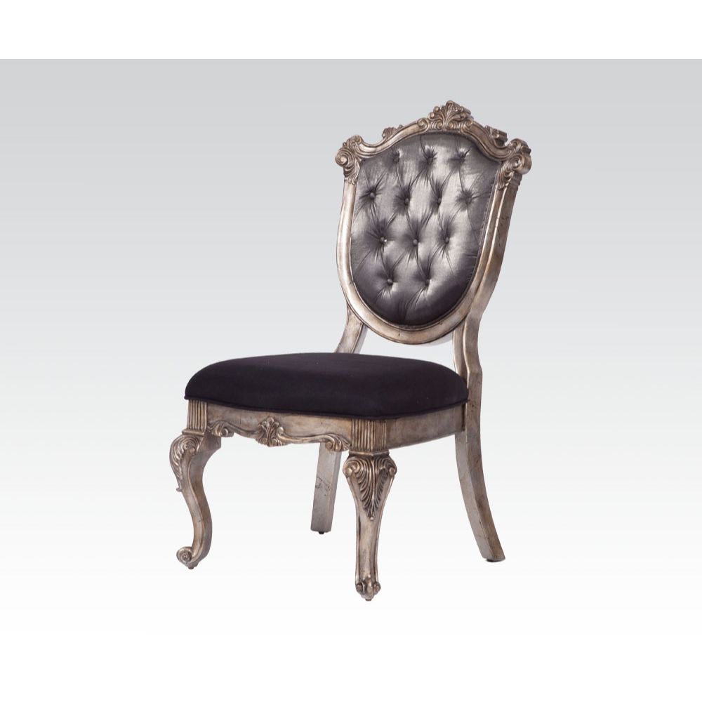 Antique silver dining chair with tufted charcoal seat and back