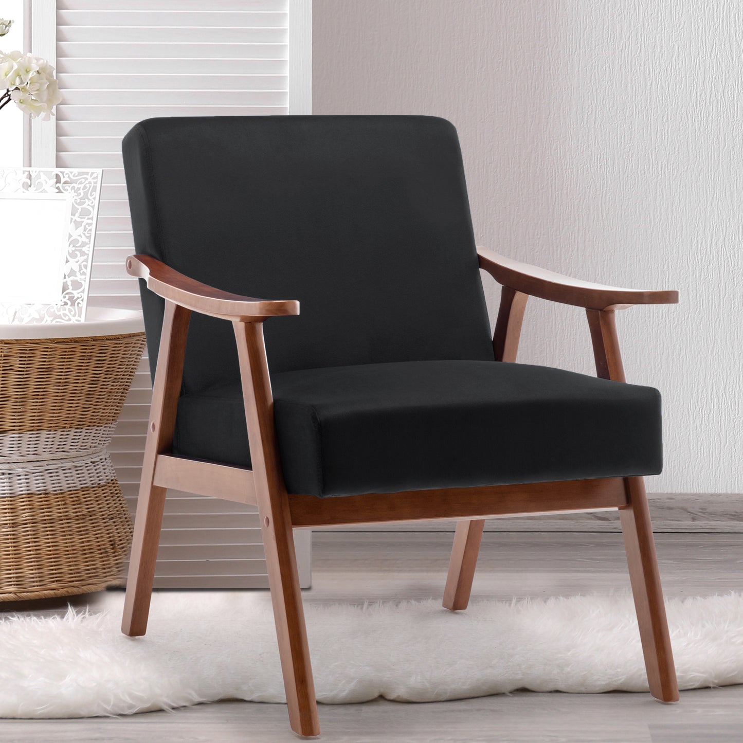 Black fabric armchair with sleek wooden frame modern design