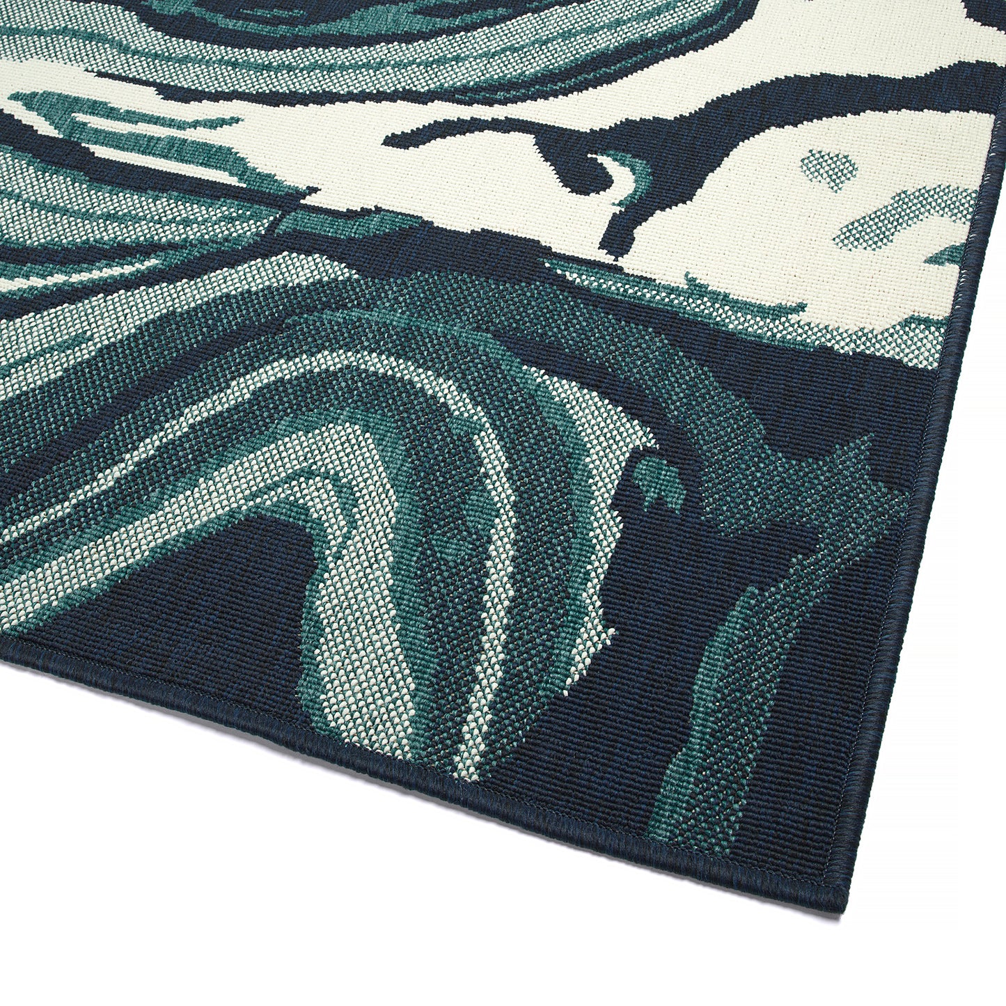 Abstract navy blue and teal wave pattern indoor area rug