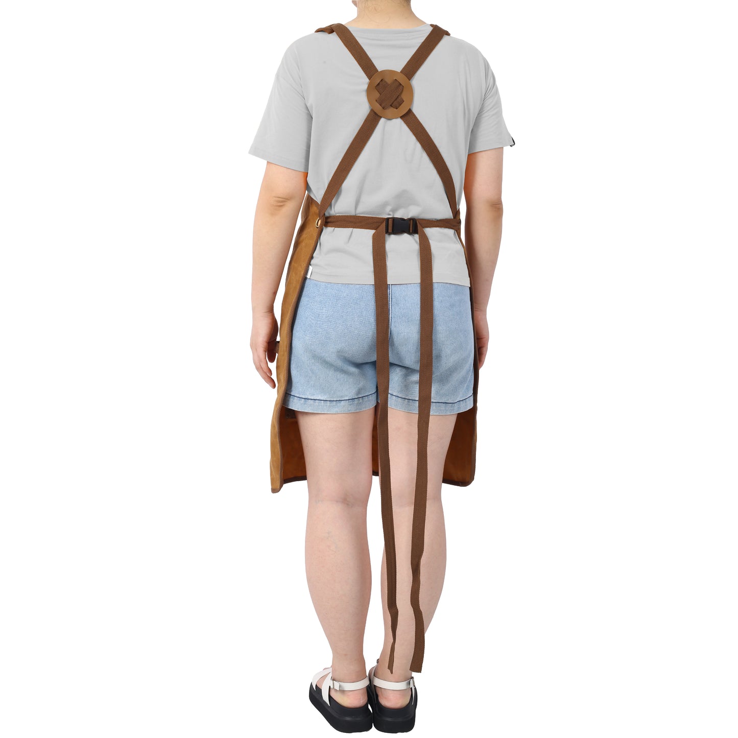 Brown canvas work apron with adjustable buckle and crossstrap back for comfort