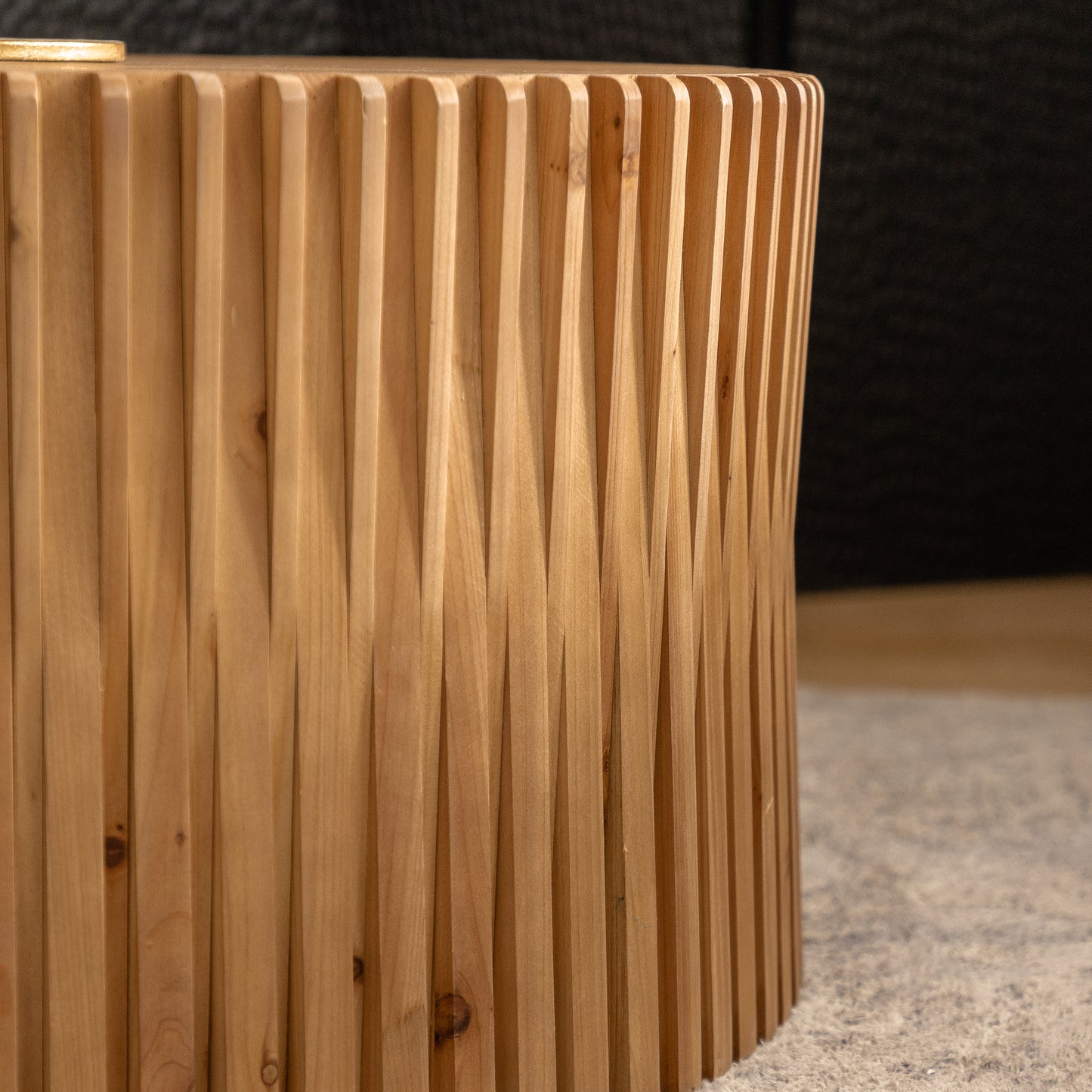 Natural wood accent table with fluted design perfect for modern living rooms