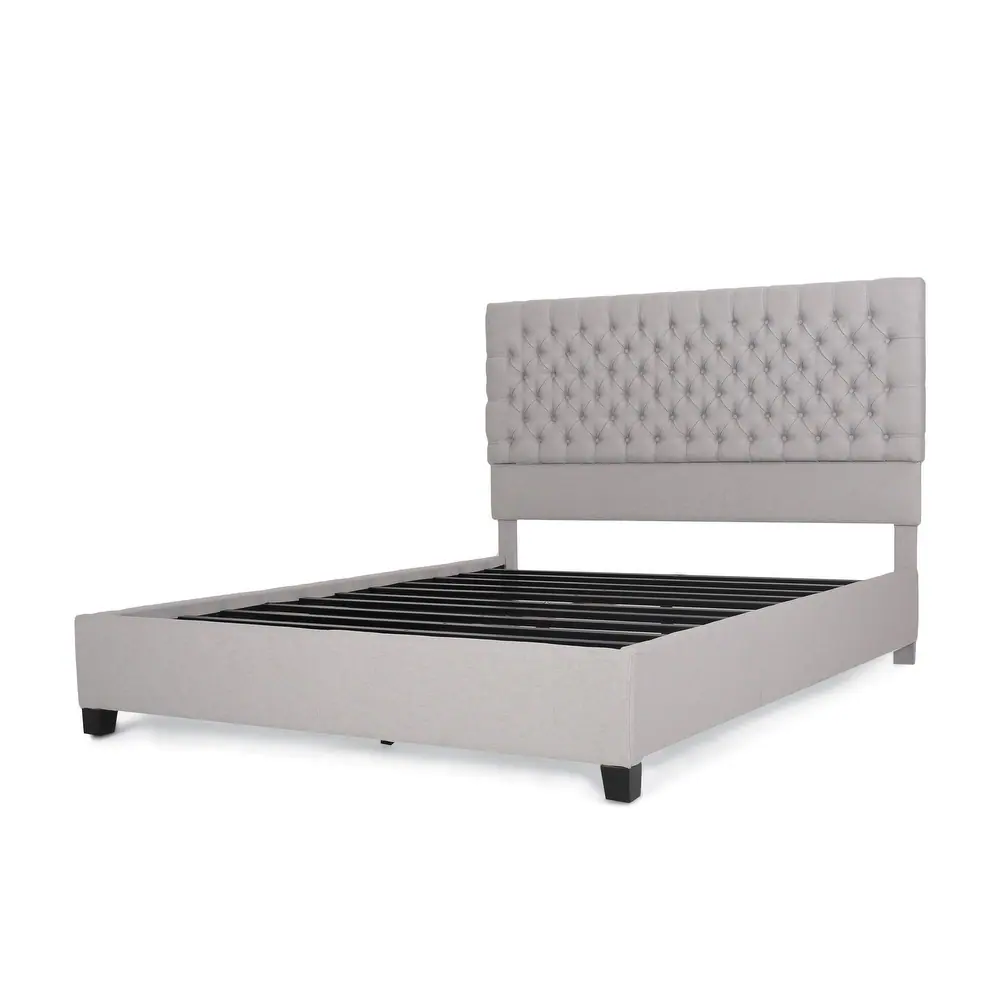 Light grey tufted upholstered platform bed frame with wooden legs modern design