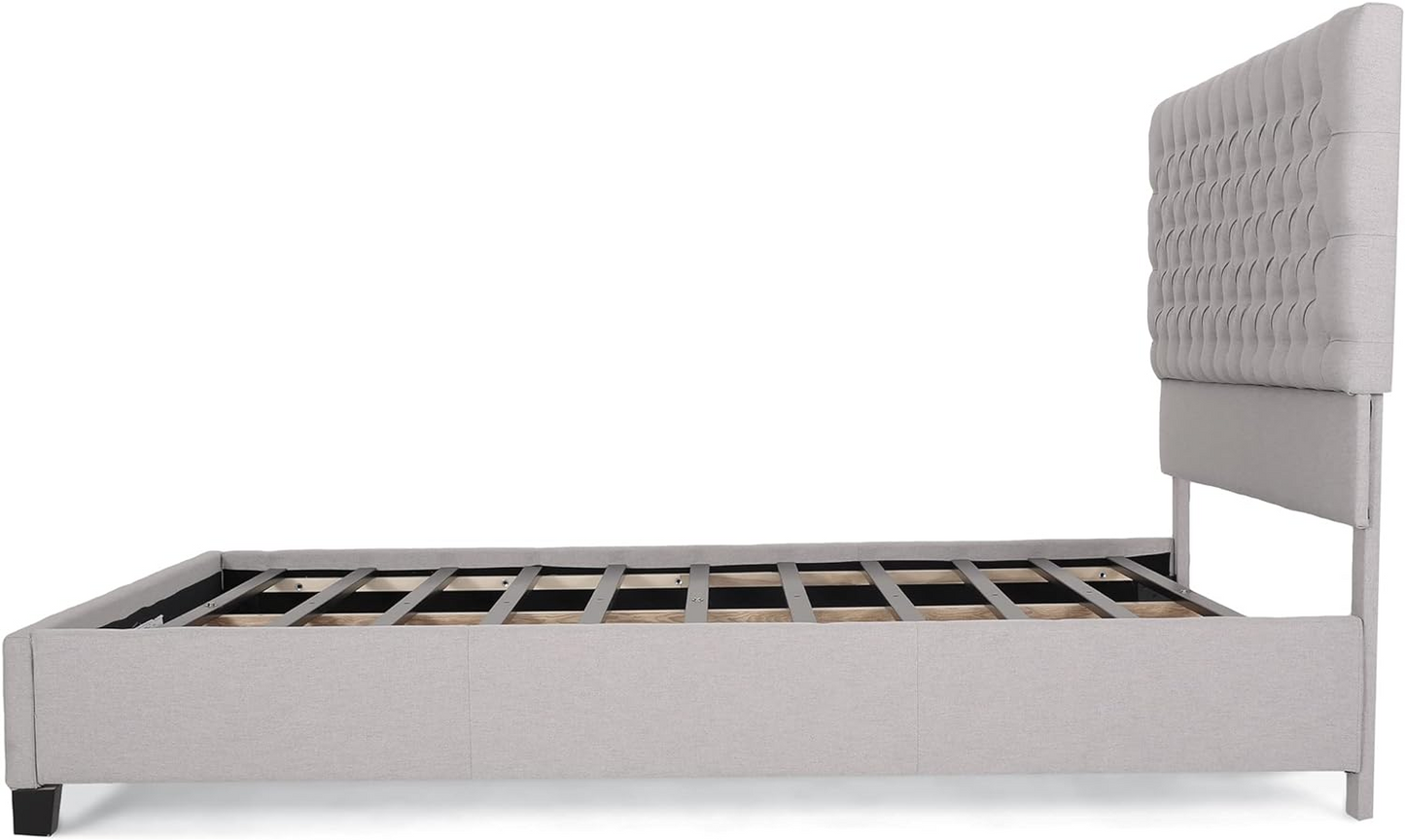 Light gray upholstered queen bed frame with buttontufted headboard