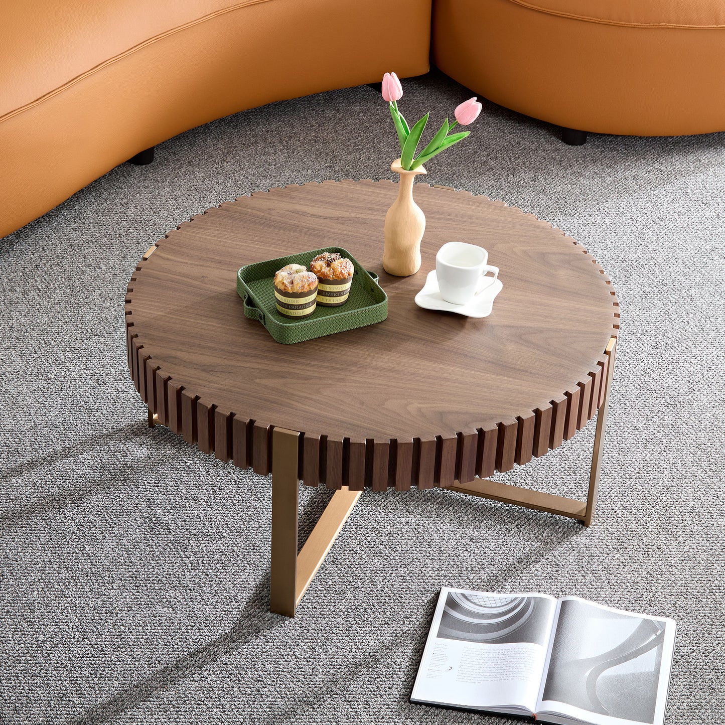 Round walnut coffee table with metal legs featuring a modern slatted design and a warm wood finish