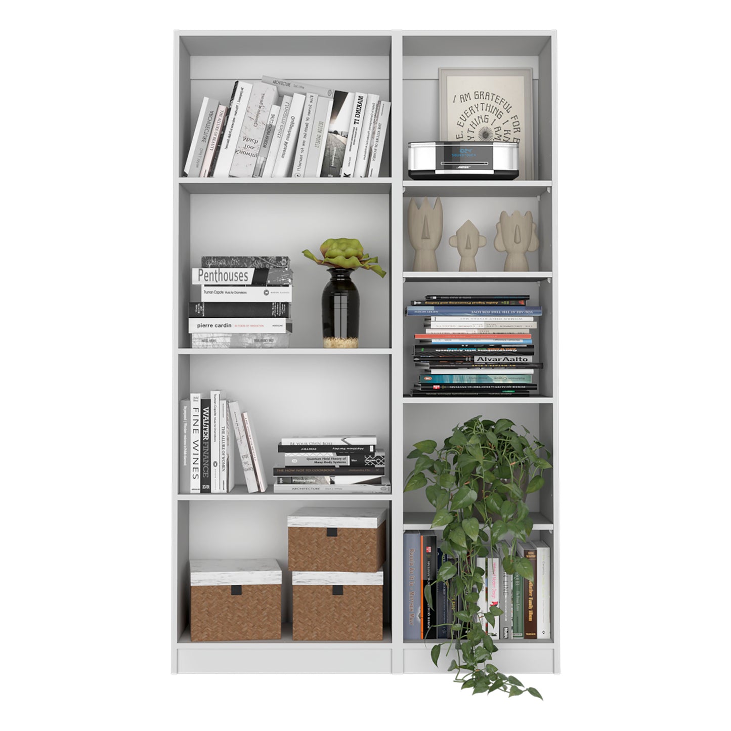 Collection of assorted hardcover books on a white bookshelf including Penthouse and Pierre Cardin