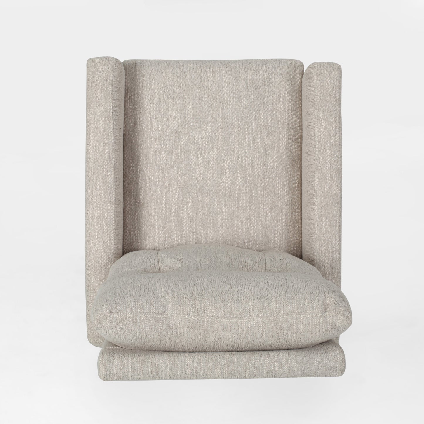 Beige upholstered wingback chair with plush seat cushion ideal for modern living rooms