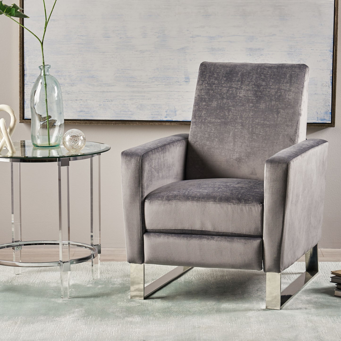 Elegant grey velvet armchair with polished chrome legs perfect for modern living rooms