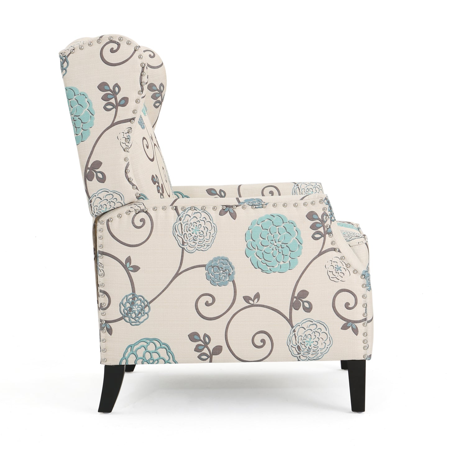 Cream wingback accent chair with blue floral pattern and nailhead trim