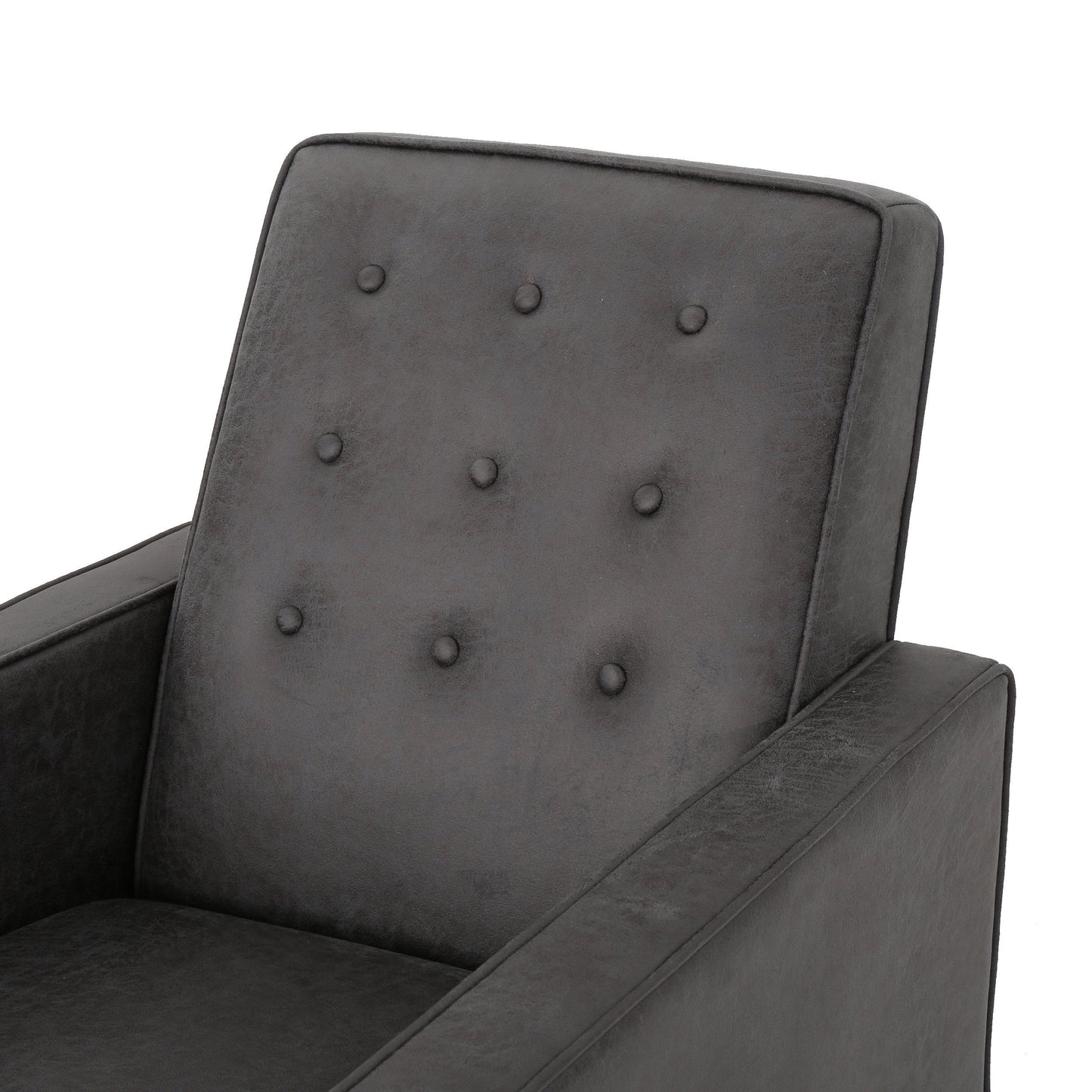 Tufted dark gray faux leather accent chair with deep button details and padded arms