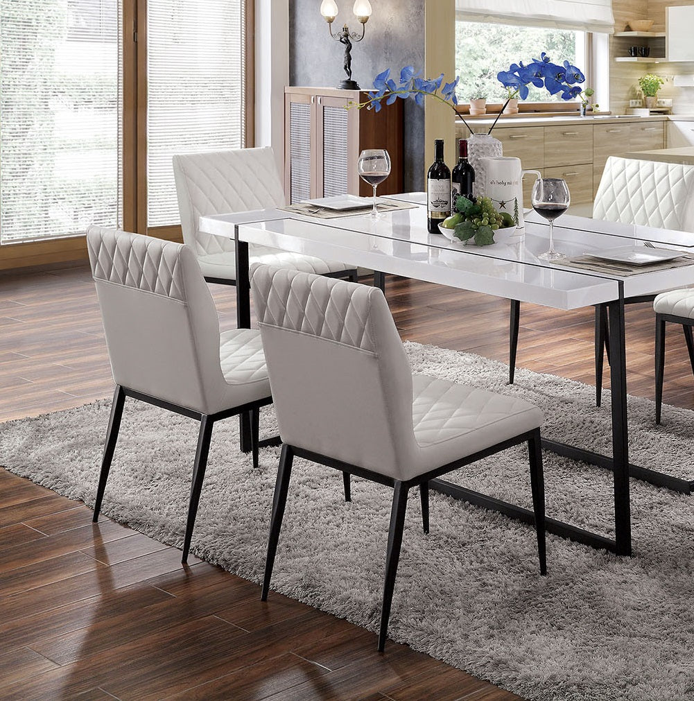 Diamondstitched grey upholstered dining chair with black metal legs