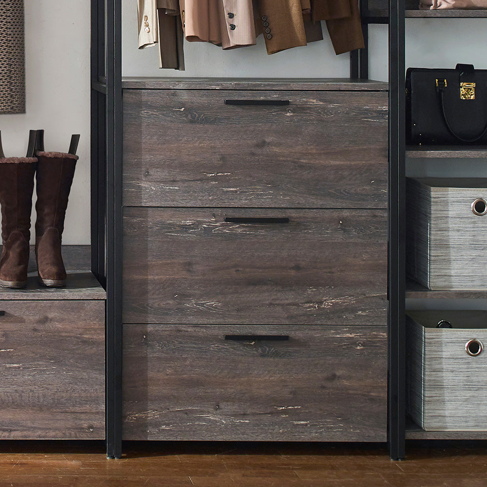 Dark wood dresser with three drawers and black handles