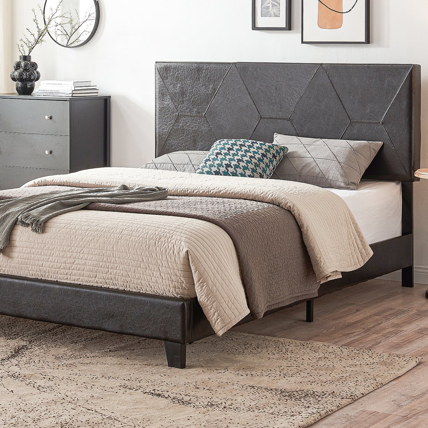 Dark gray faux leather bed frame with geometric headboard