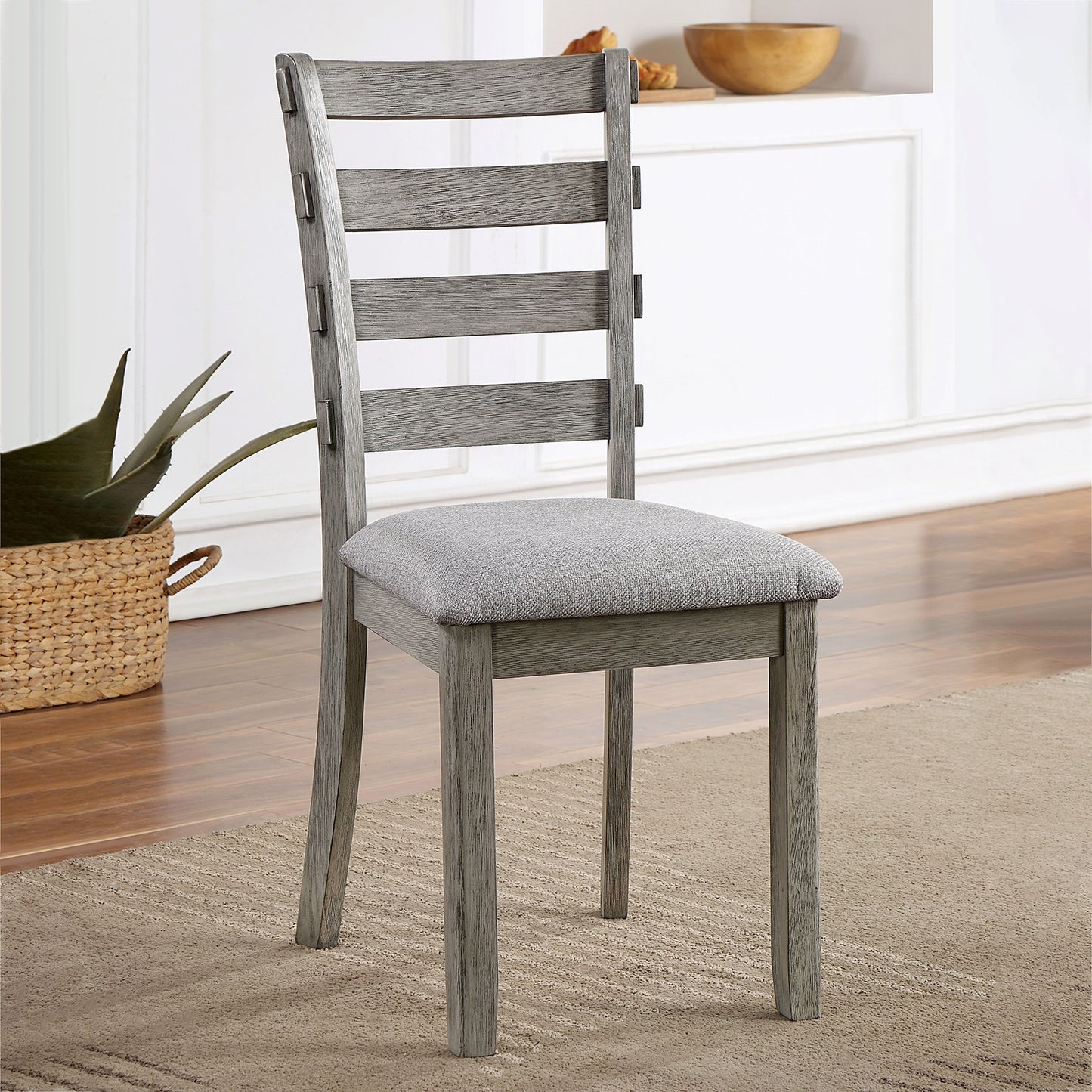 Grey wood ladderback dining chair with upholstered seat