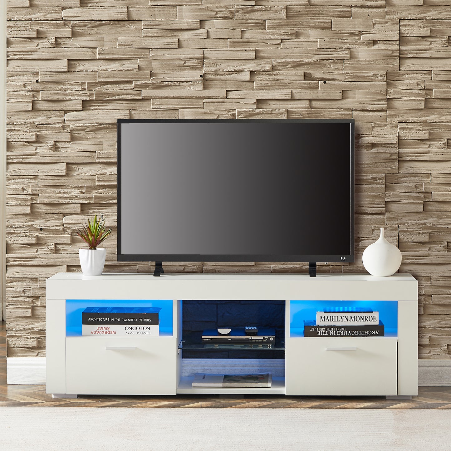 Modern white TV stand with blue LED lighting and ample storage