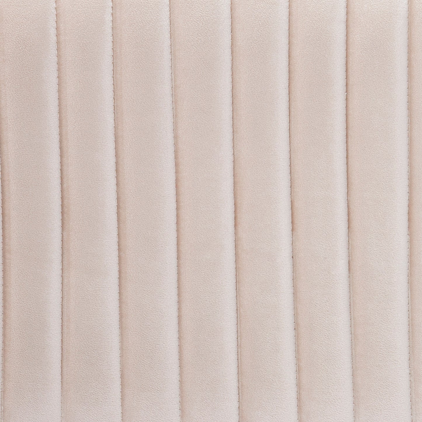 Closeup of beige quilted velvet fabric for upholstery showing vertical stitch details