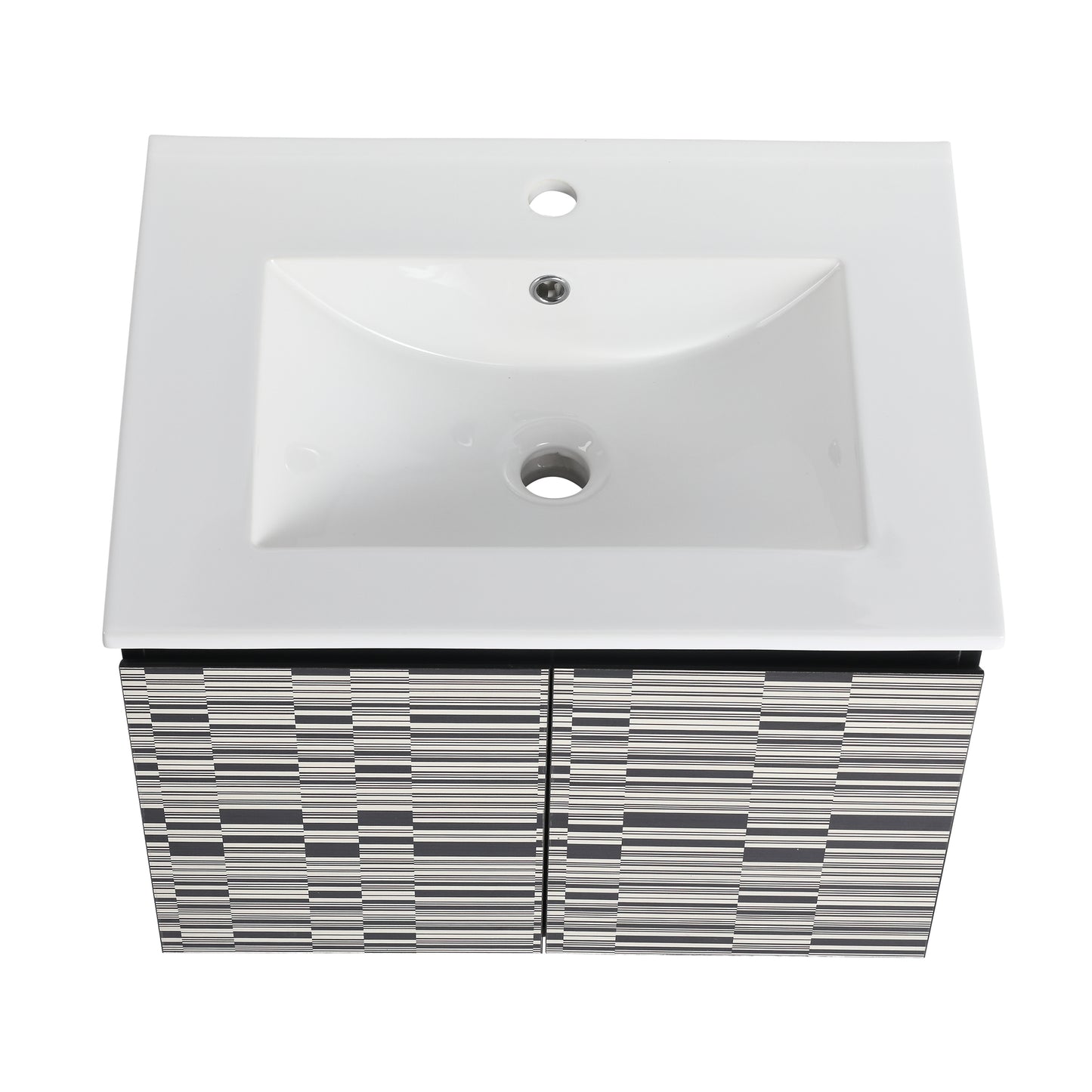 White ceramic bathroom vanity with patterned black and white cabinet doors