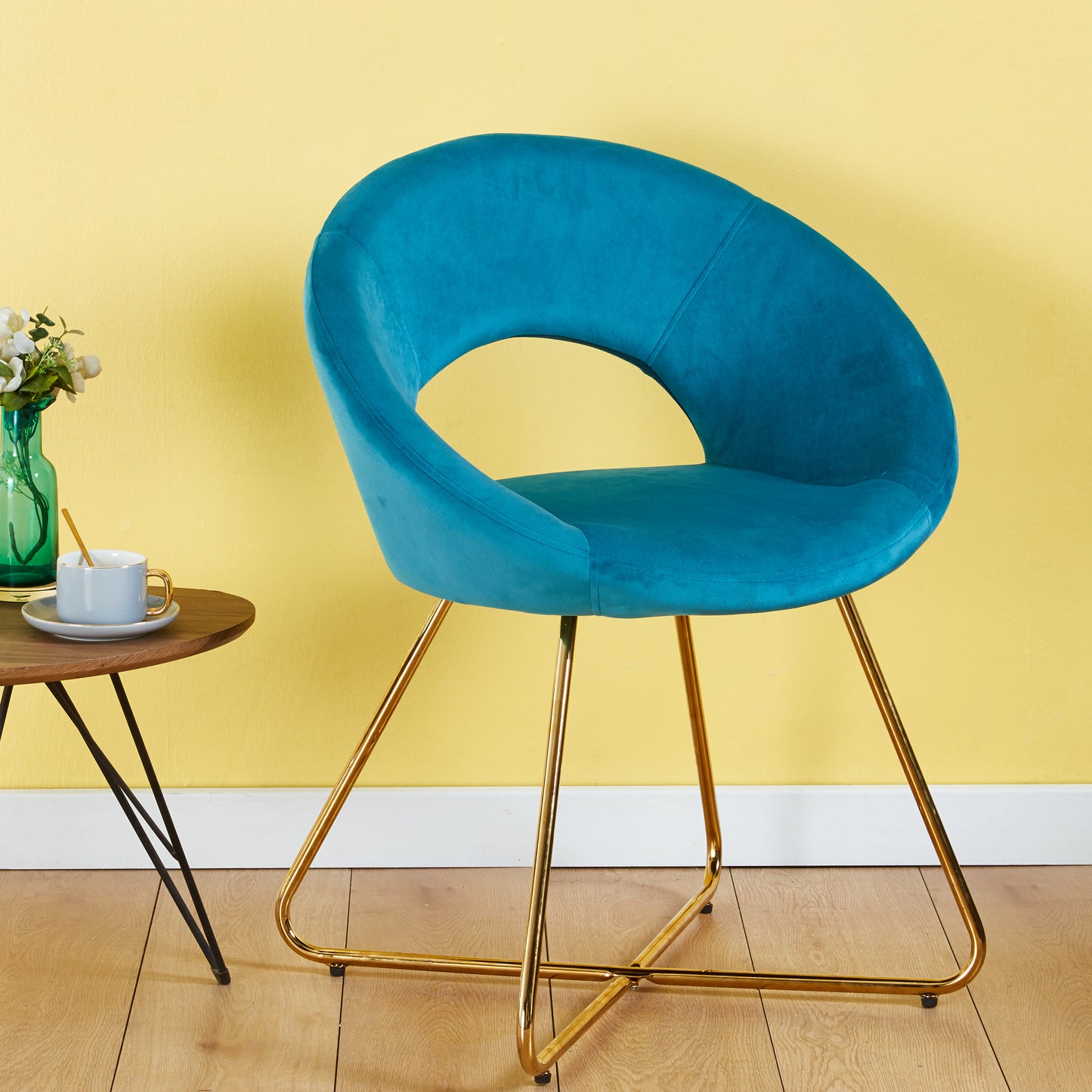 Teal velvet accent chair with polished gold metal legs midcentury modern design