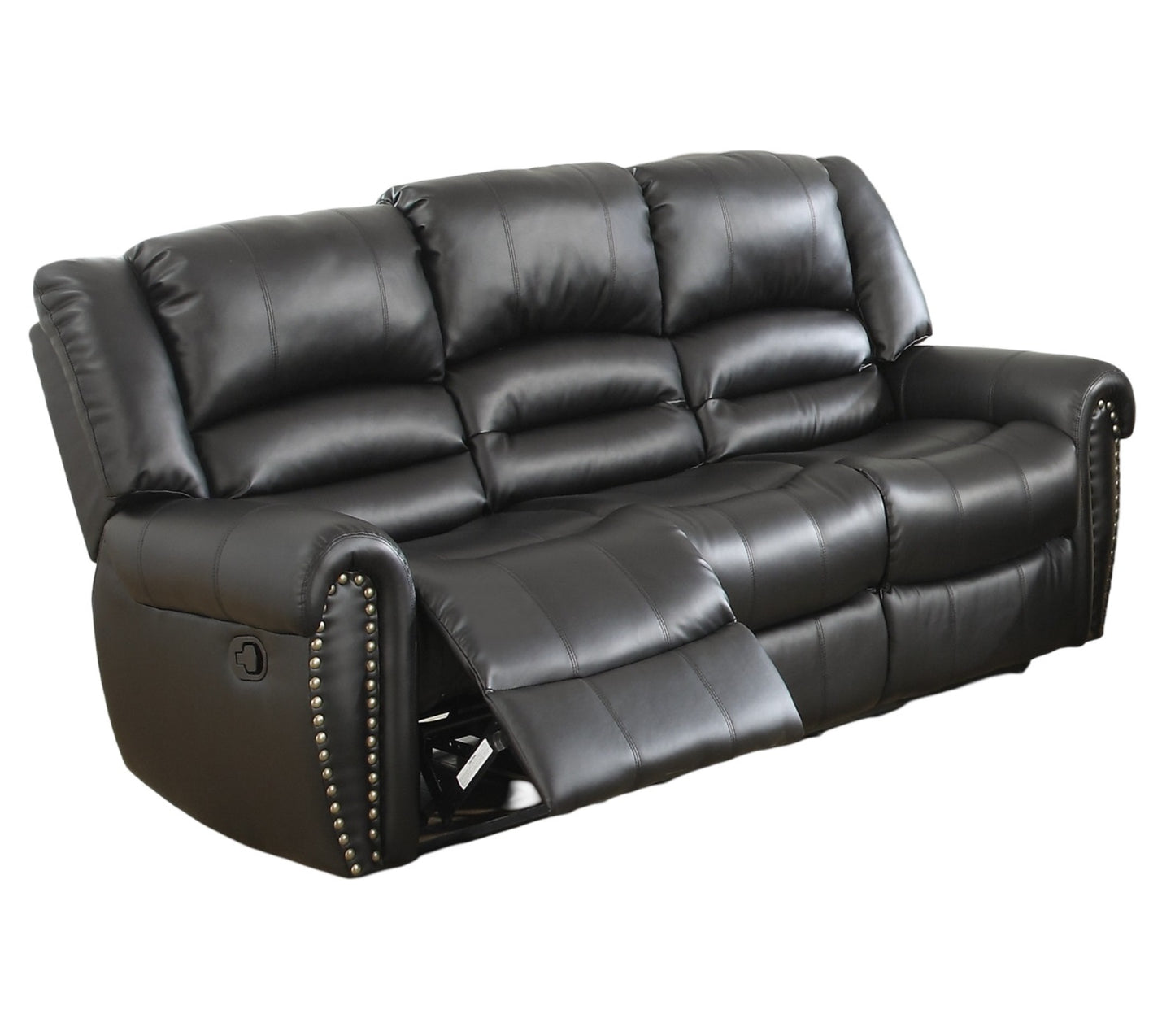 Black faux leather reclining sofa with studded armrests and plush cushions