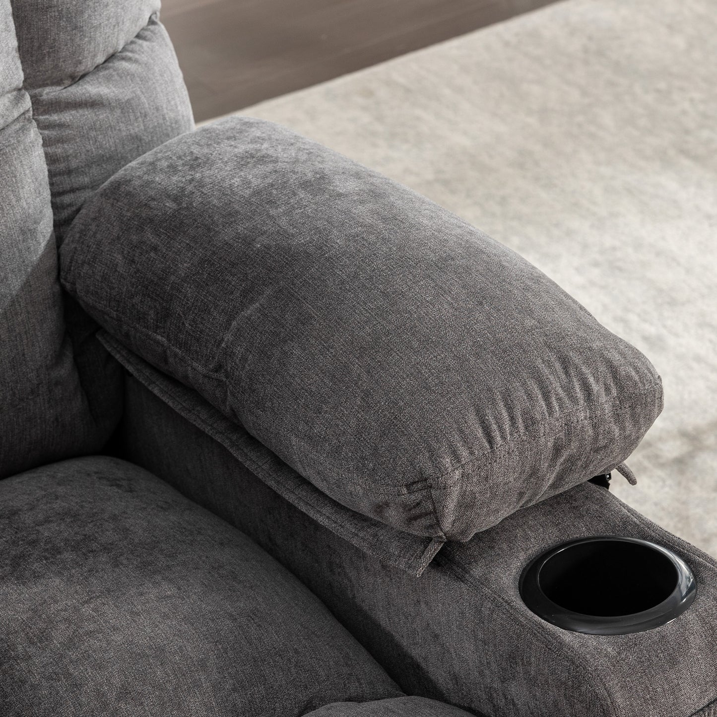 Gray fabric recliner armrest with builtin black cup holder for ultimate relaxation