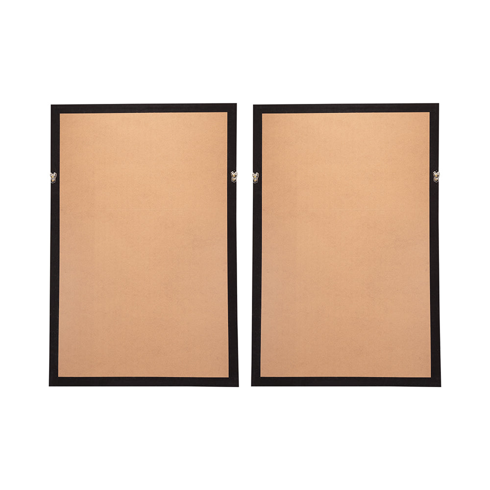 Two black framed cork boards shown from the back
