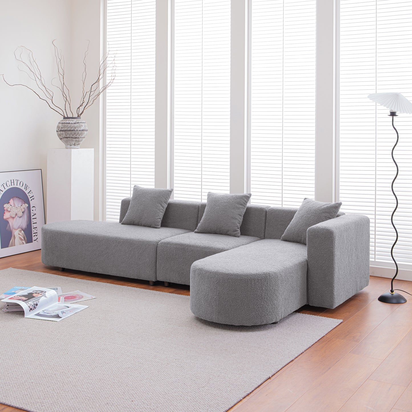 Gray sectional sofa with textured fabric and plush cushions modern living room furniture