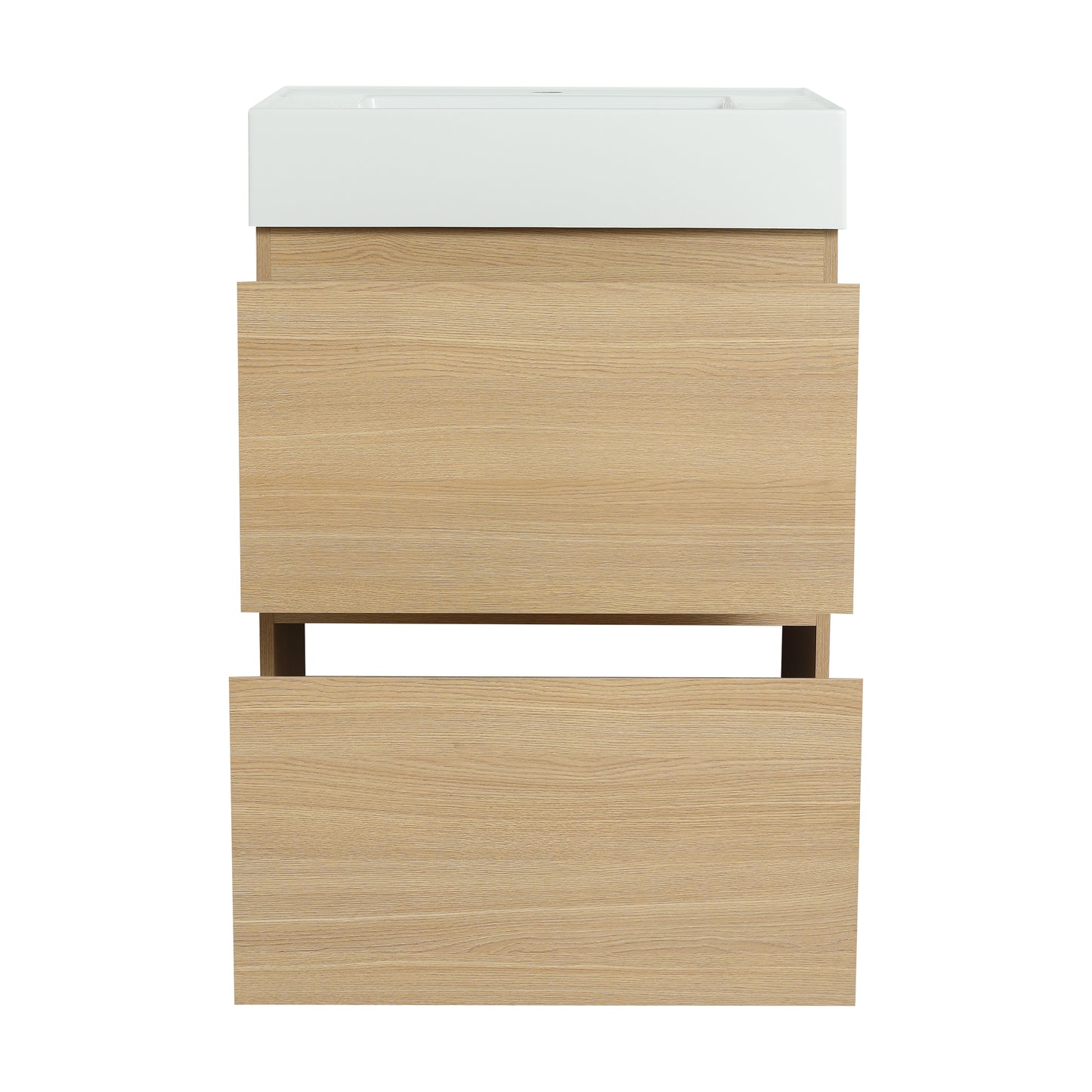 Modern white ceramic sink atop a light oak vanity with two drawers