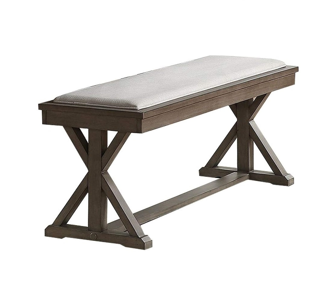 Rustic wood bench with upholstered grey seat