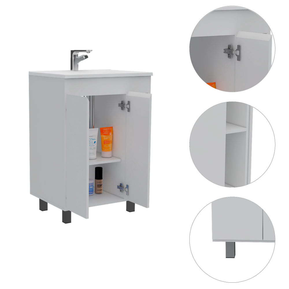 Compact white bathroom vanity with open doors revealing toiletries and a sink faucet