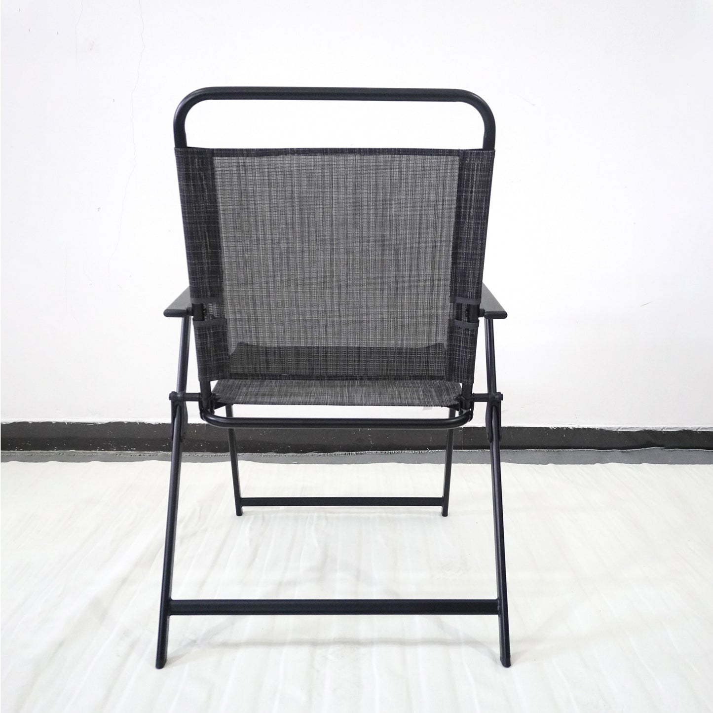 Black mesh folding chair with black metal frame ideal for outdoor patios