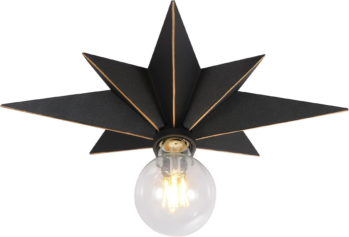 Black starburst flush mount light fixture with gold trim and exposed Edison bulb
