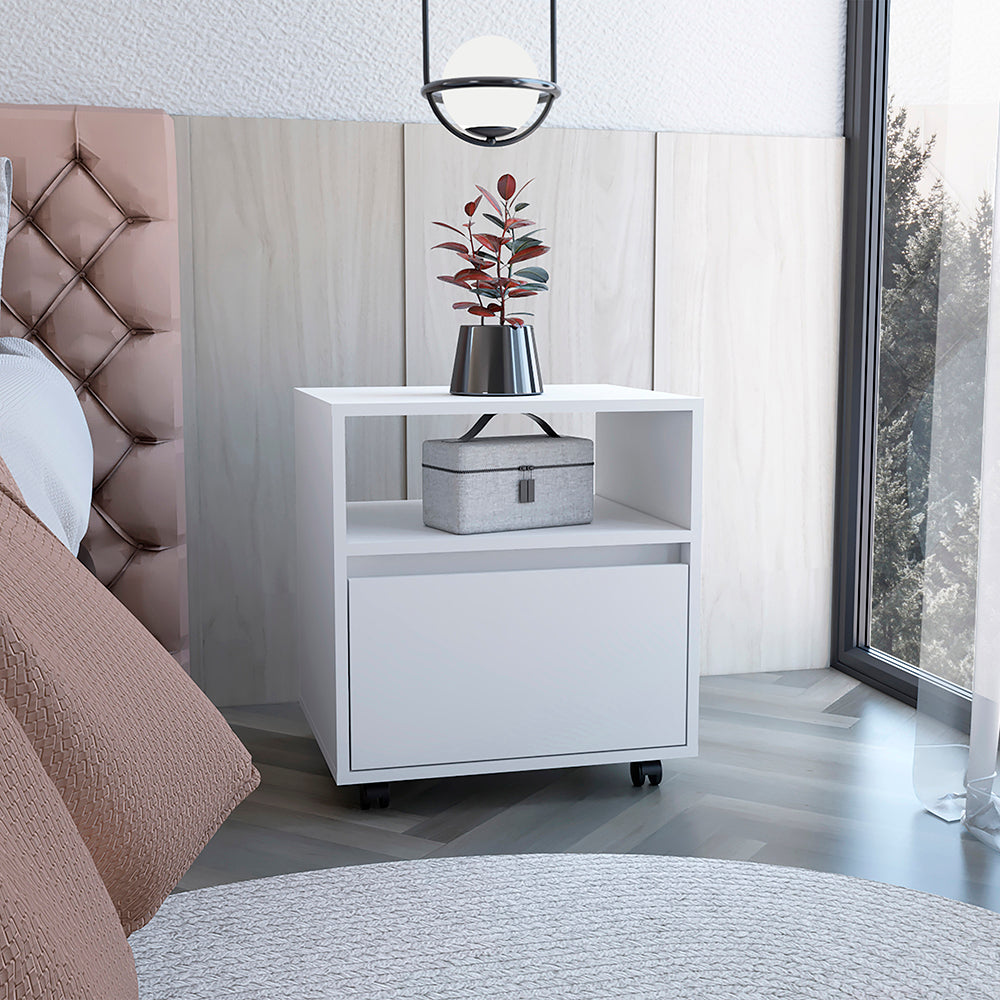 Modern white bedside table with one drawer and open shelf featuring caster wheels