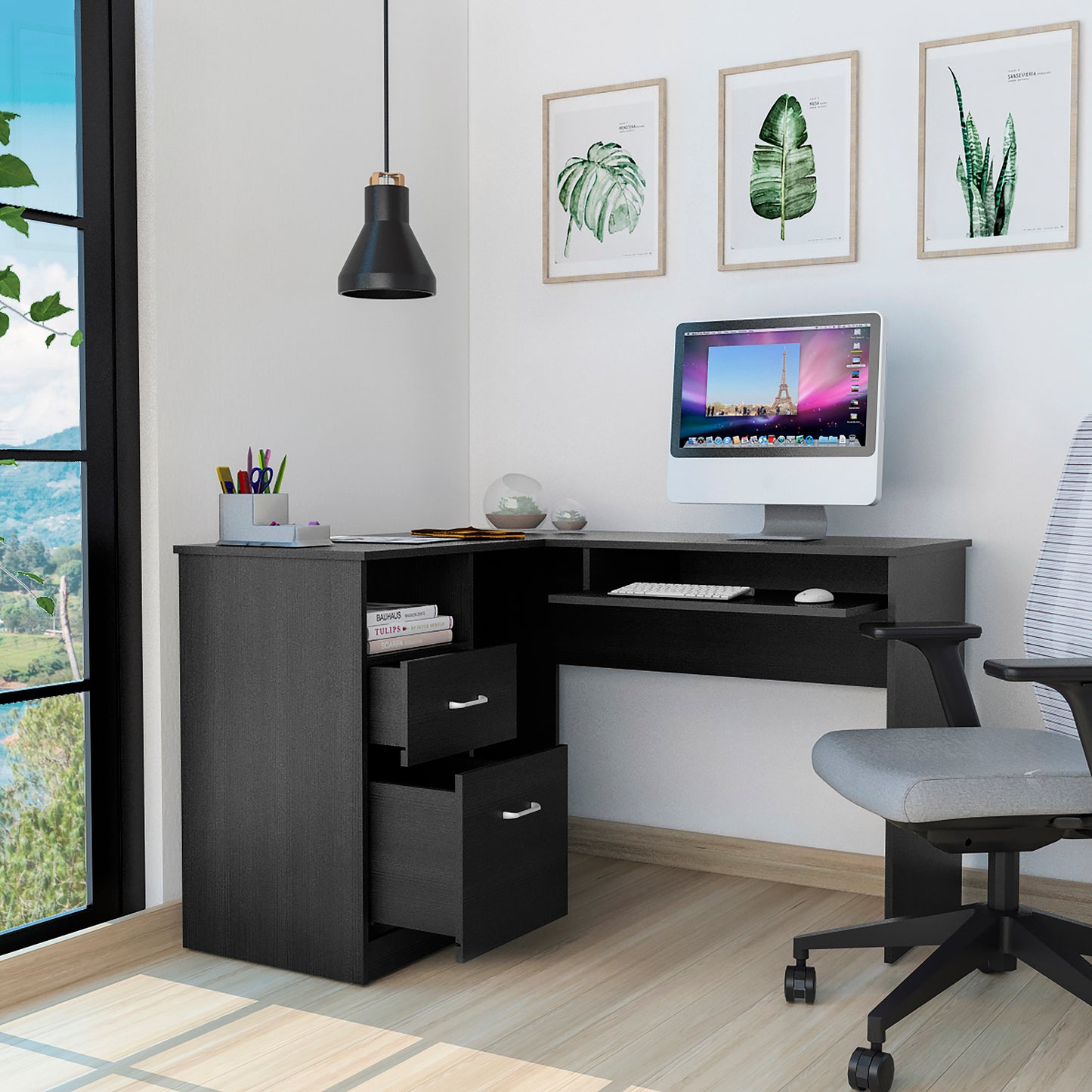 Black Lshaped computer desk with keyboard tray and three drawers for office storage