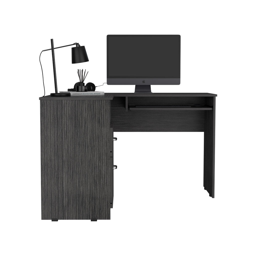 Dark gray wood grain computer desk with a pullout keyboard tray and three drawers for home office