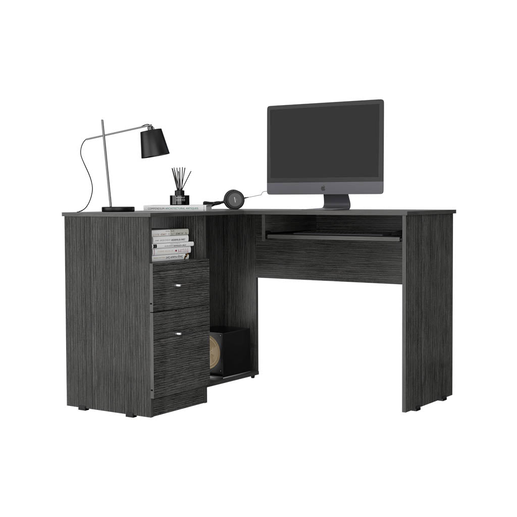 Dark gray wood grain lshaped computer desk with monitor keyboard lamp and books