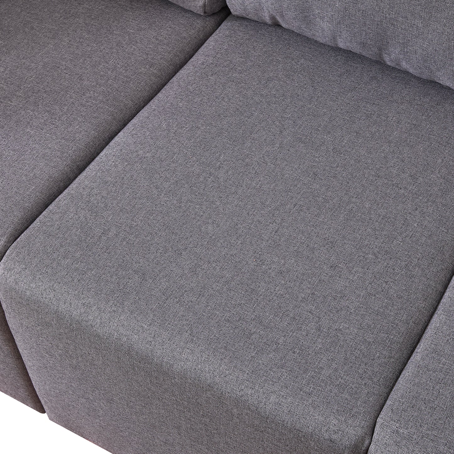Closeup of textured grey fabric on a modern sofa cushion