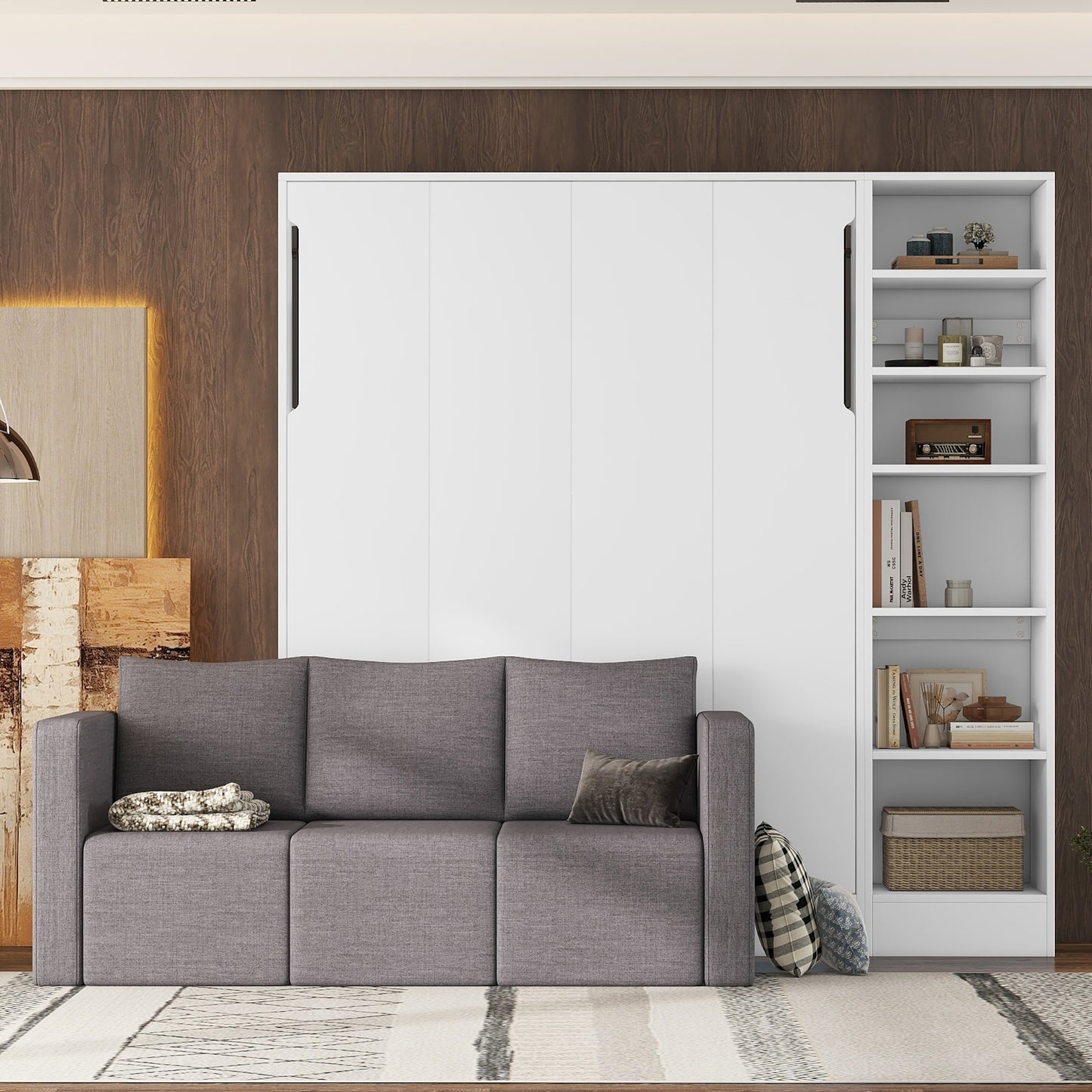 Modern grey sofa bed with integrated white wall unit and shelving