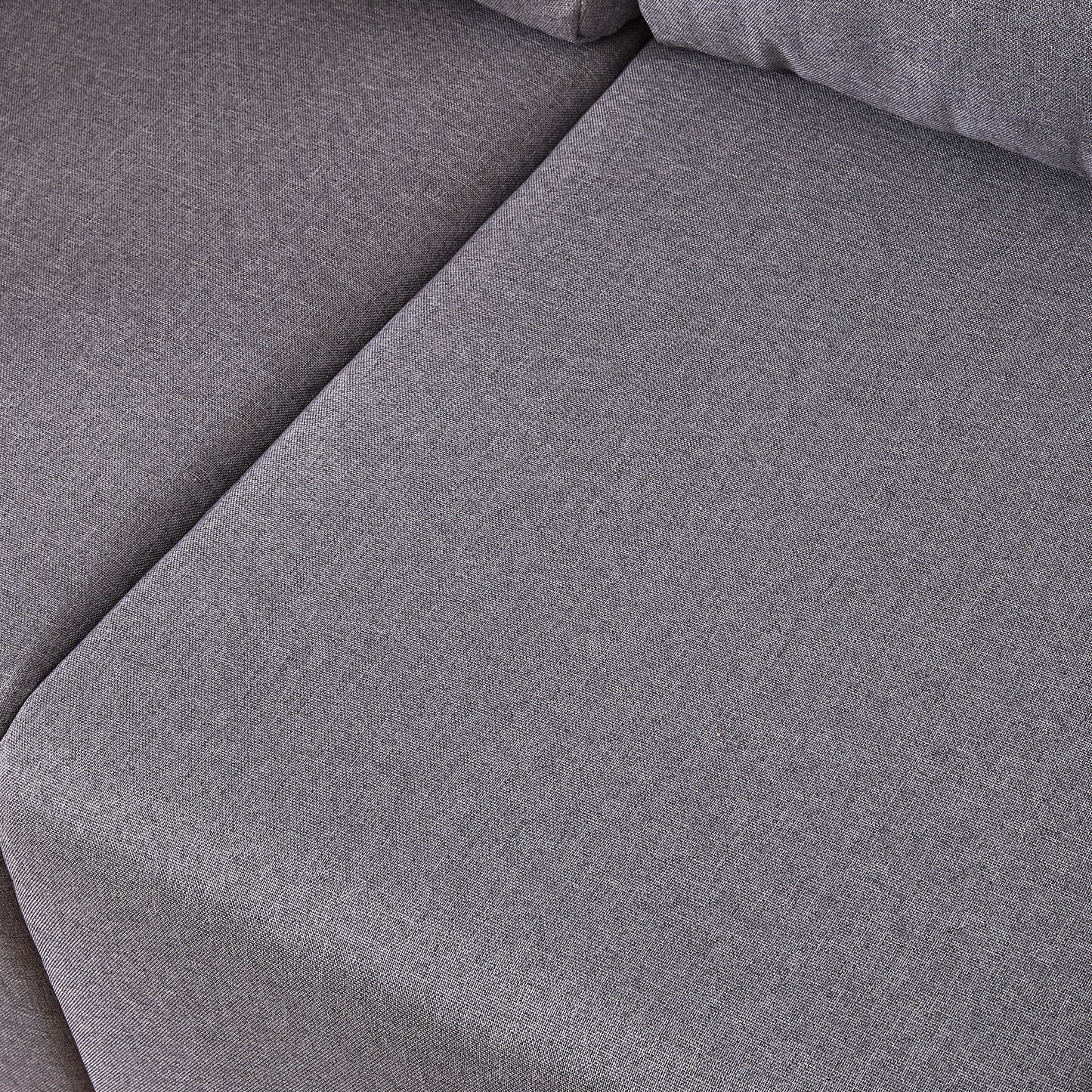 Closeup of dark grey textured fabric upholstery