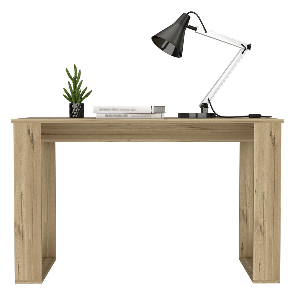 Light oak wood console table with modern black desk lamp and plant
