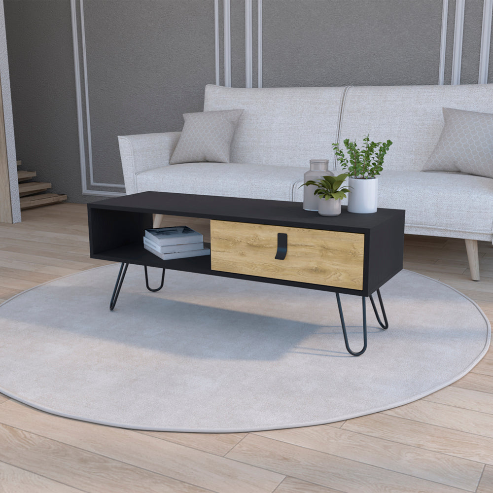 Modern black coffee table with a single woodgrain drawer and hairpin legs