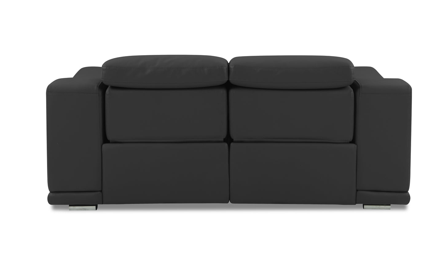 Modern dark grey leather loveseat with tufted back cushions and chrome legs