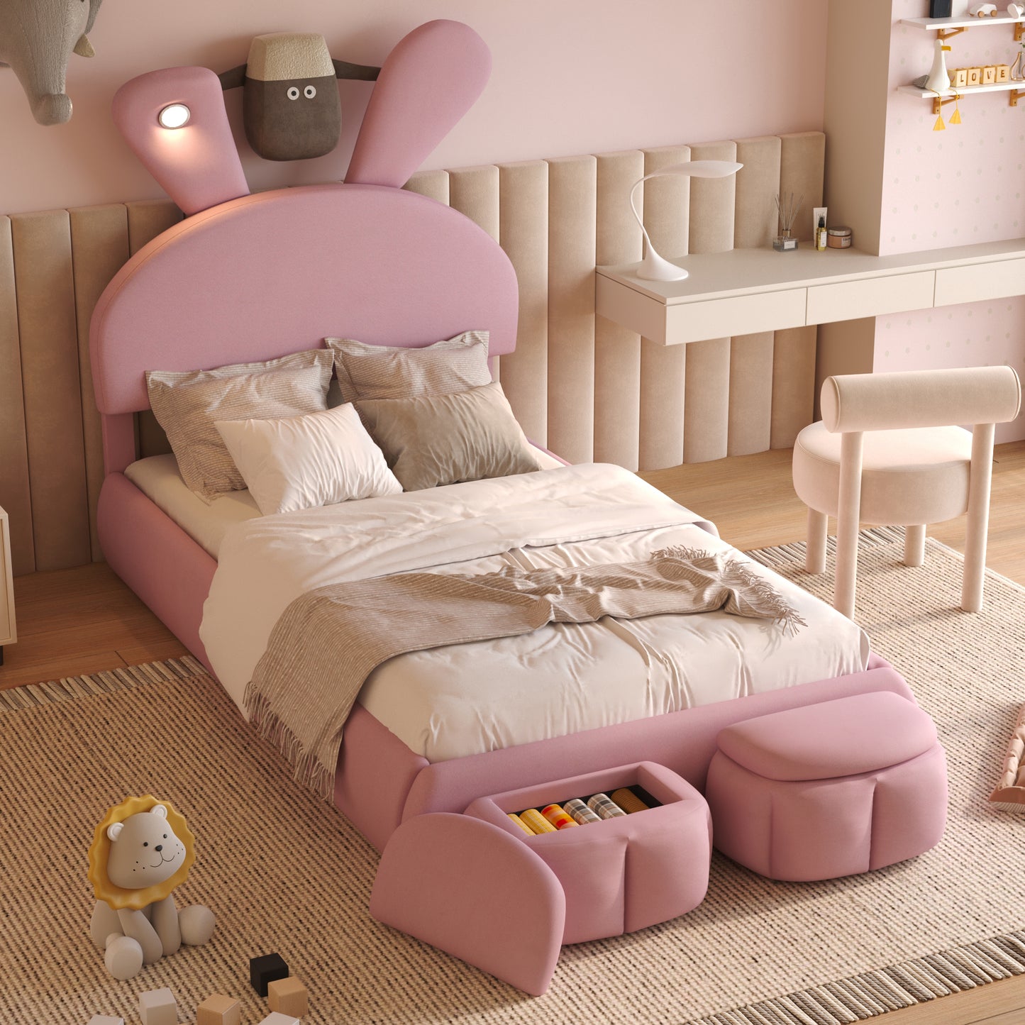 Pink upholstered childrens bed with rabbit ear headboard and builtin storage