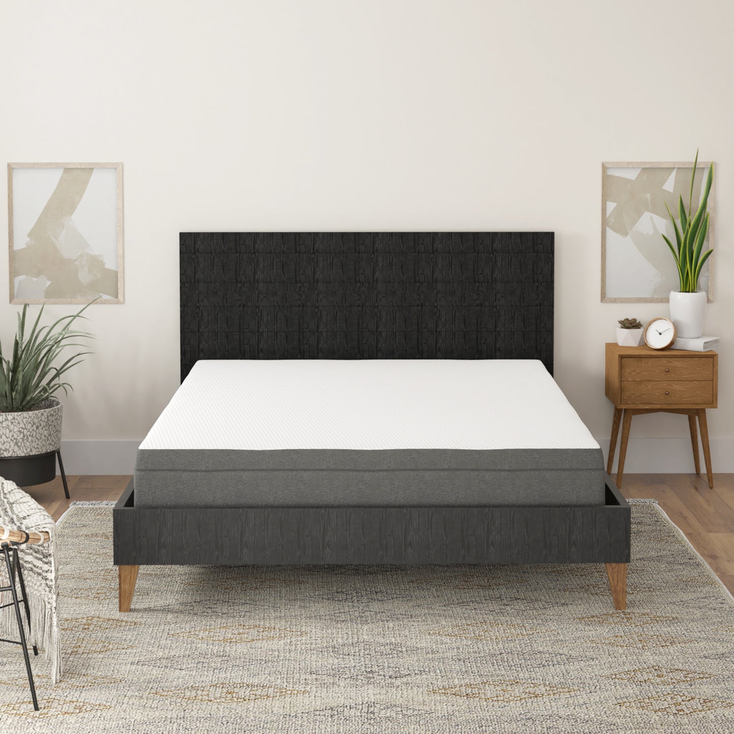 Queen size gray and white memory foam mattress on a dark wood platform bed frame