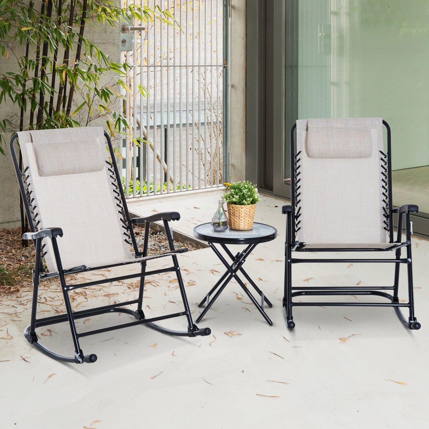 Beige zero gravity chair with black metal frame on patio