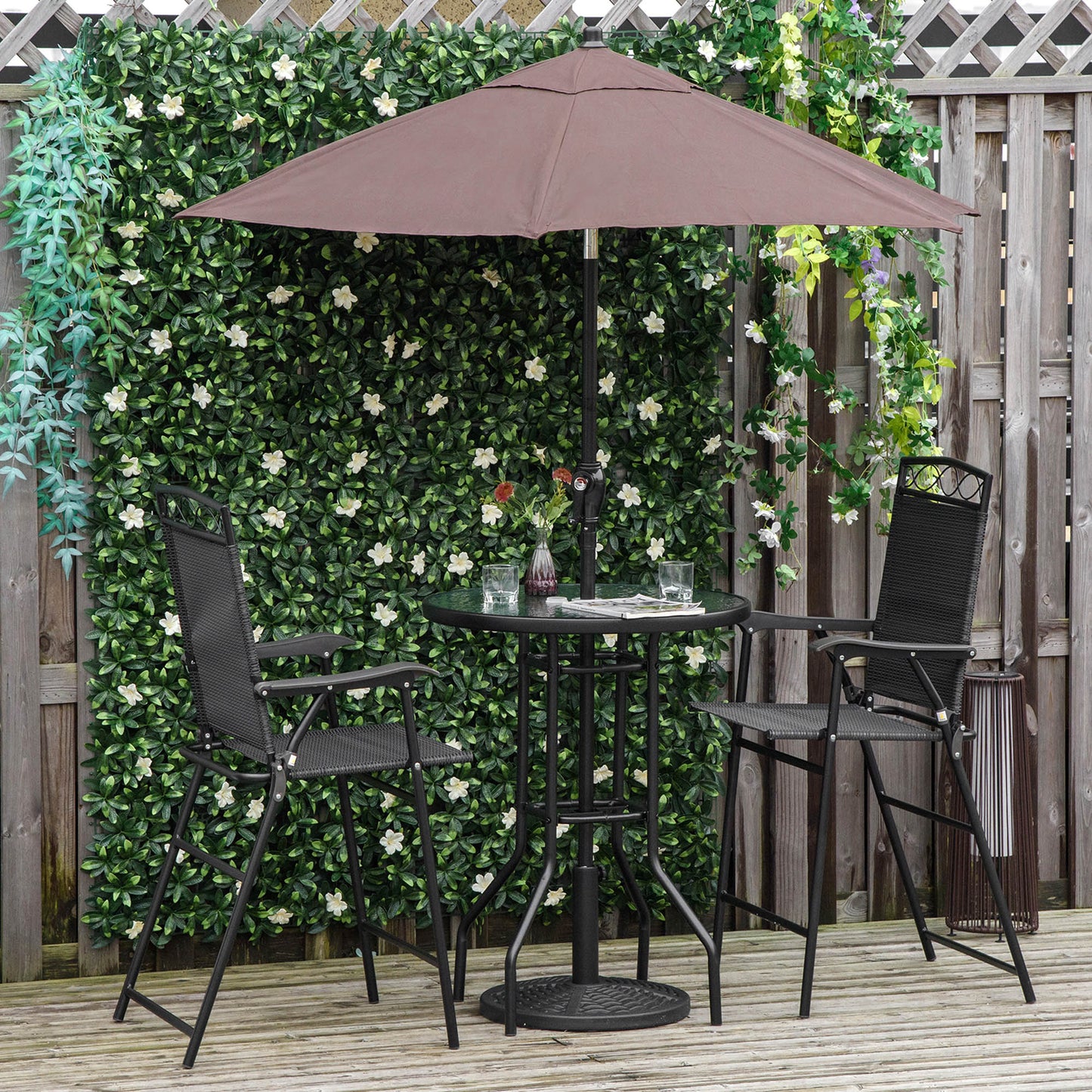 Black metal patio bar set with umbrella and two chairs