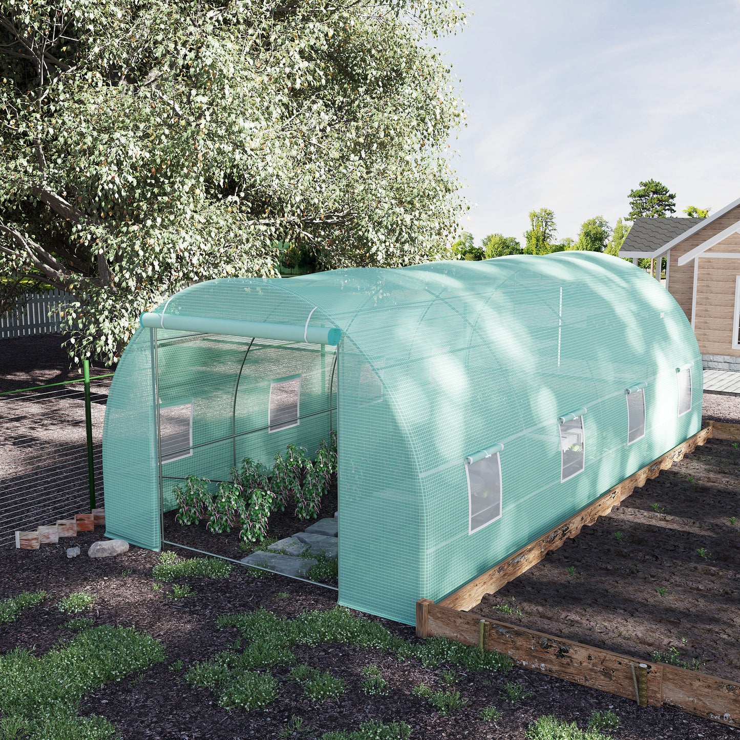Large walkin greenhouse with a rollup door and windows perfect for backyard gardening