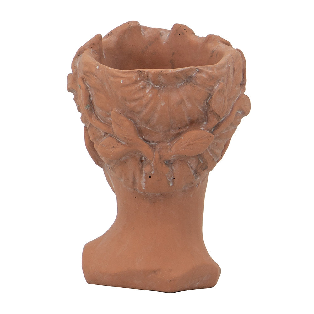 Terracotta bust planter with intricate leaf and vine detailing perfect for indoor plants